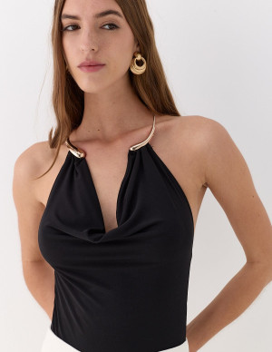 Emily Feld mélange jean large et body moulant pour Markaliste