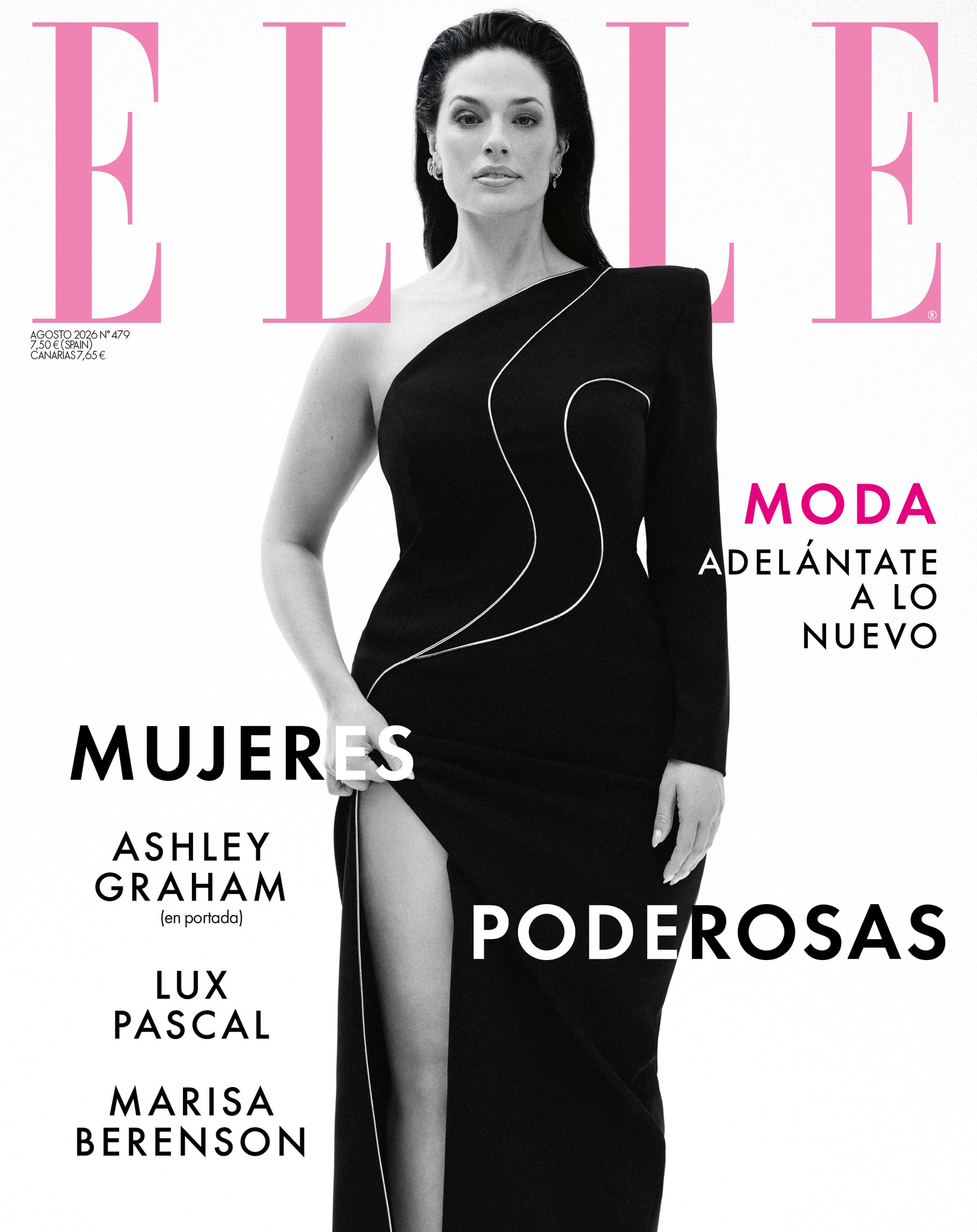 Ashley Graham en robe noire décolletée pour la couverture d’Elle Espagne